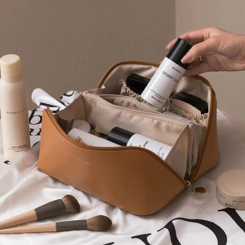 a person holding a bottle of lotion in a bag