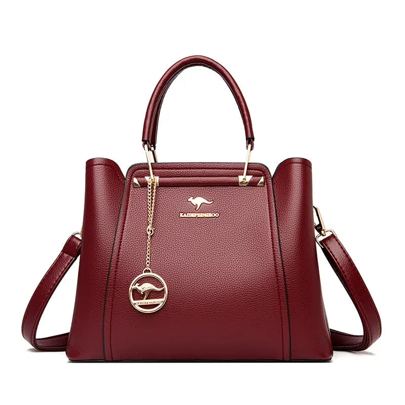 a women's handbag with a metal handle