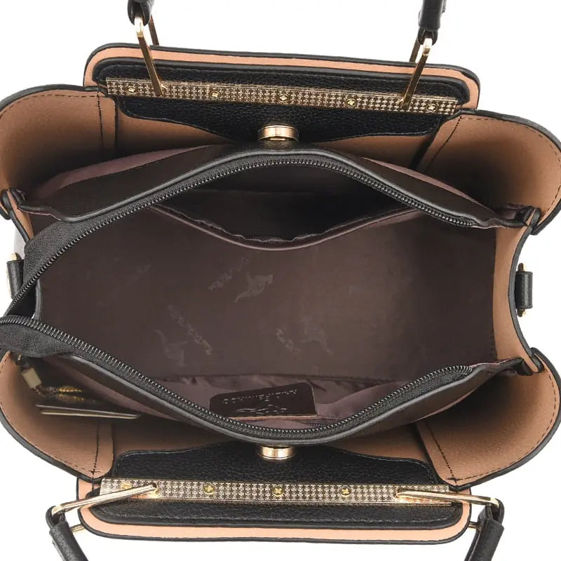 a black and tan purse on a white background