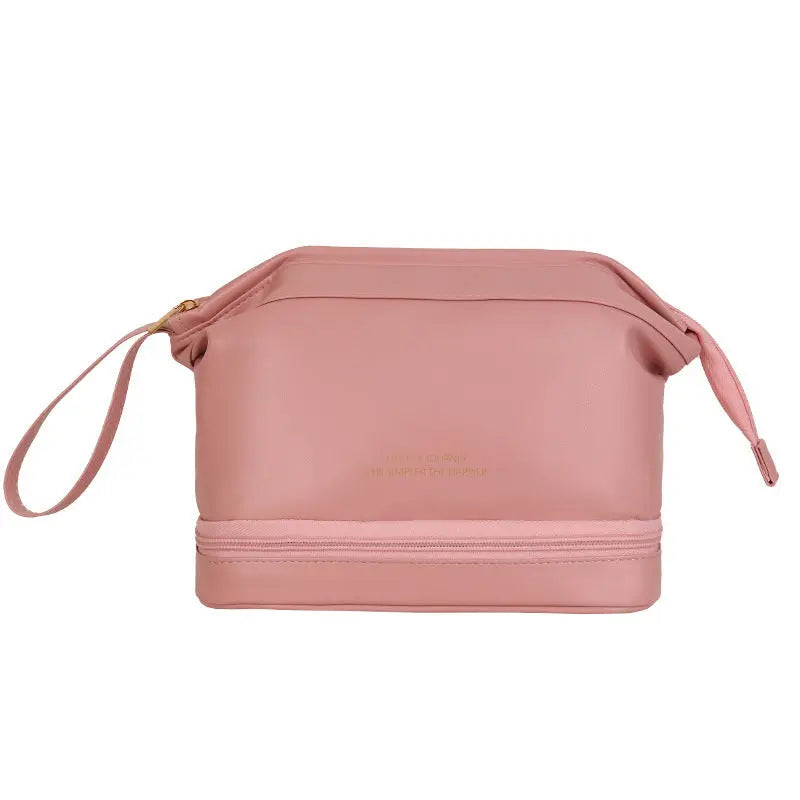 a pink bag with a strap on it