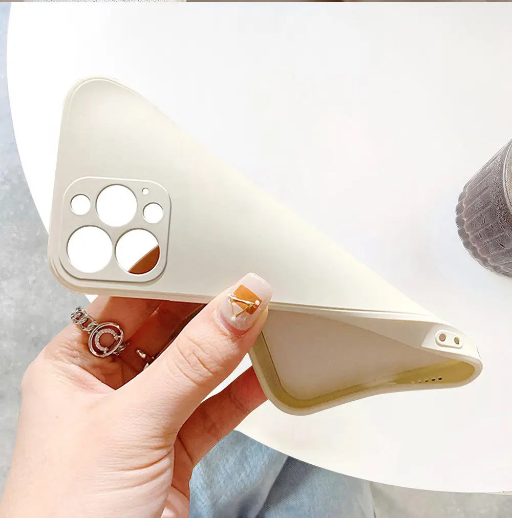 a person holding a white object with holes in it