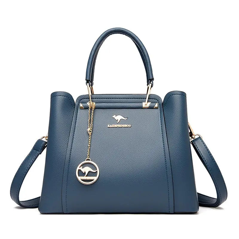 a blue handbag with a metal handle