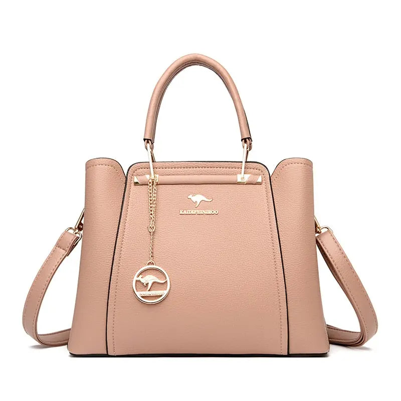 a pink handbag with a metal handle